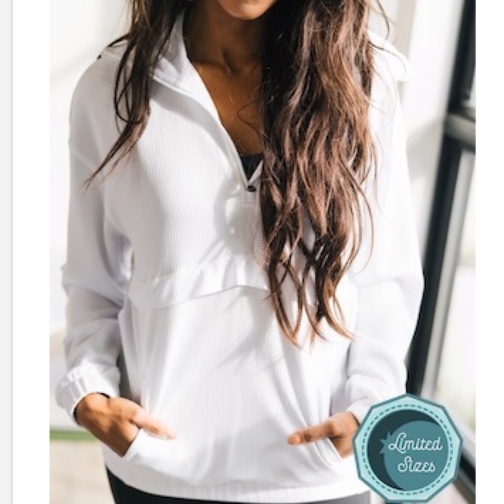 ISO this 1/4 zip jacket in white